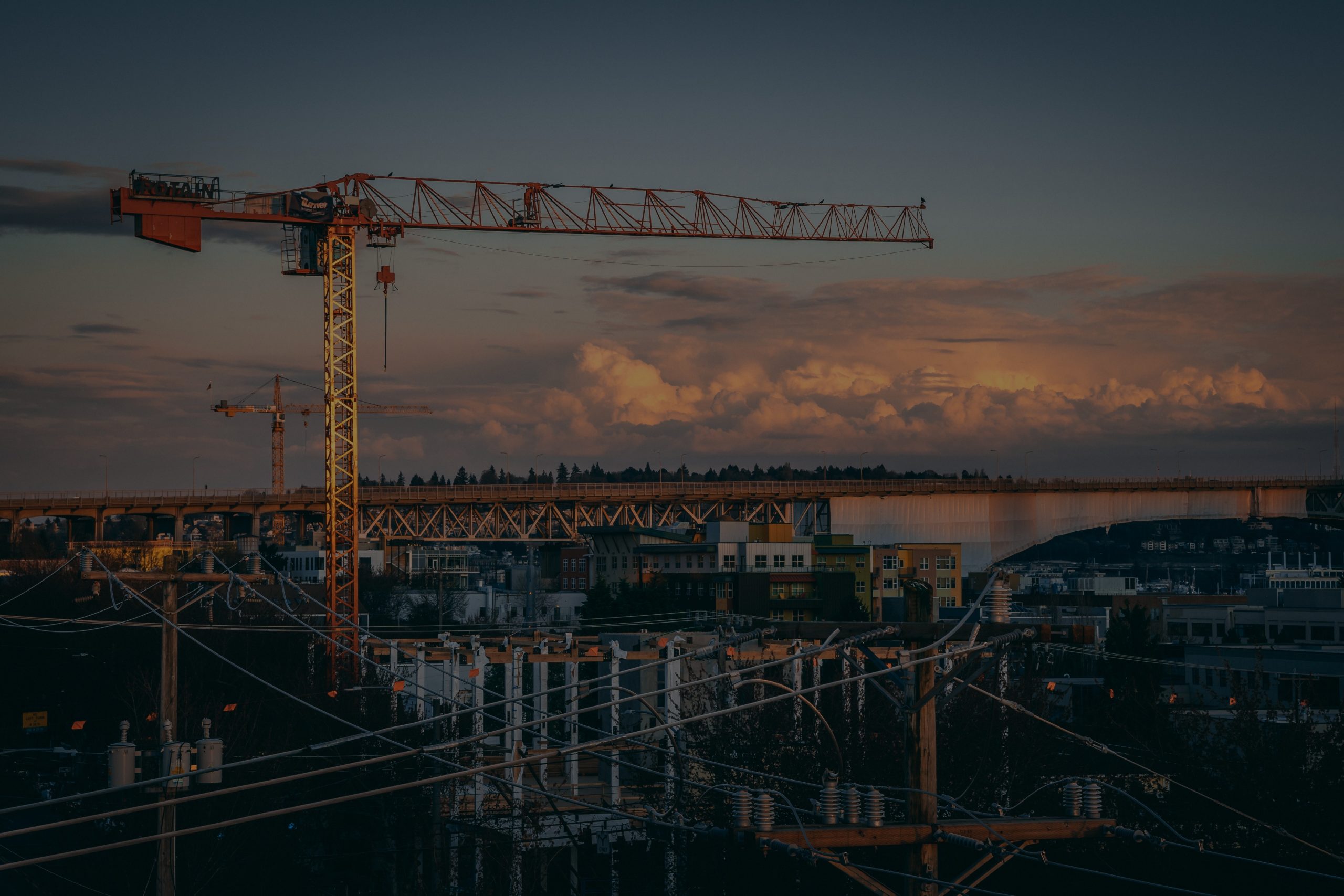 beautiful-view-construction-site-city-sunset-photoaidcom-darken